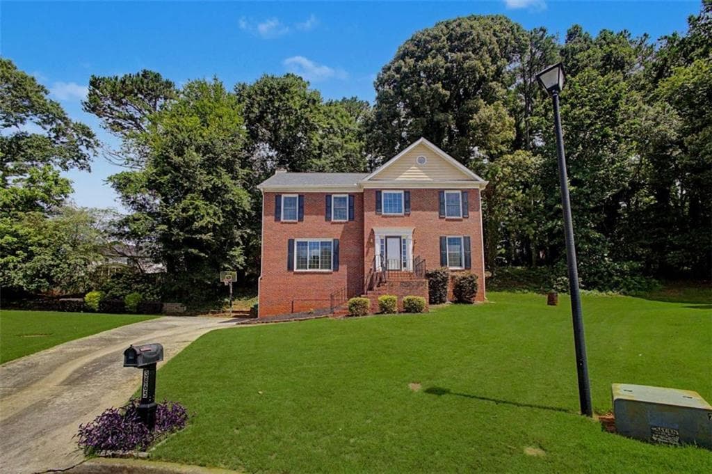 4 bedroom, 3 bathroom, 2,434 sq ft single family residence for sale at 3865 Ryans Run Way, Lilburn, GA 30047 — photo 2