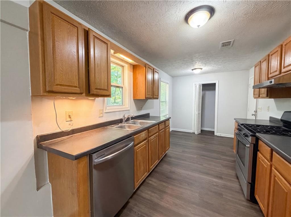 3 bedroom, 2 bathroom, 1,412 sq ft single family residence for sale at 85 Hartley Woods Drive, Kennesaw, GA 30144 — photo 4