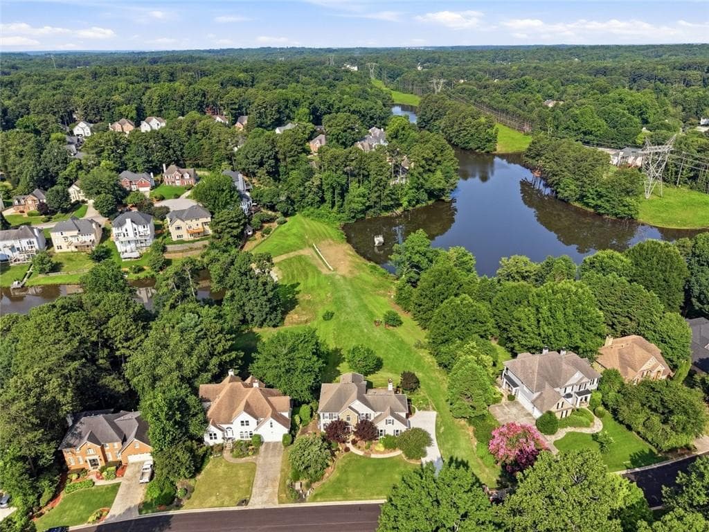 5 bedroom, 4 bathroom, 5,200 sq ft single family residence for sale at 2332 Merrymount Drive, Suwanee, GA 30024 — photo 2