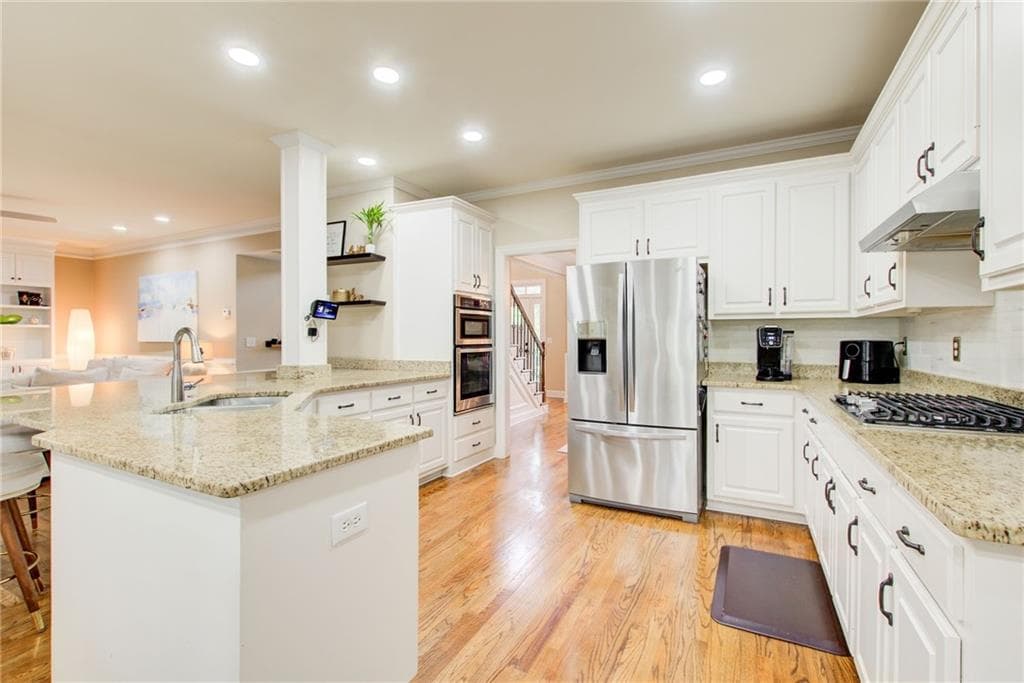 5 bedroom, 4 bathroom, 4,477 sq ft single family residence for sale at 2452 Twilight View, Snellville, GA 30078 — photo 6