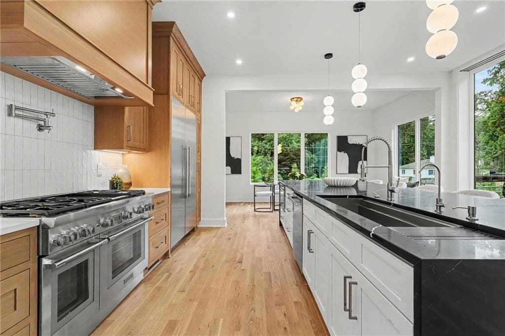 6 bedroom, 4 bathroom, 7,587 sq ft single family residence for sale at 1242 Brook Forest Drive, Atlanta, GA 30324 — photo 8