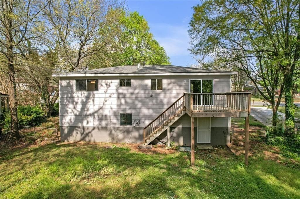 4 bedroom, 2 bathroom, 1,800 sq ft single family residence for sale at 149 ROY HUIE Road, Riverdale, GA 30274 — photo 2