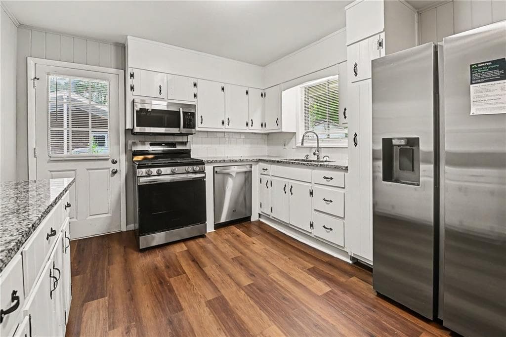 3 bedroom, 2 bathroom, 1,419 sq ft single family residence for sale at 1623 Jolly Green Court, Conley, GA 30288 — photo 3