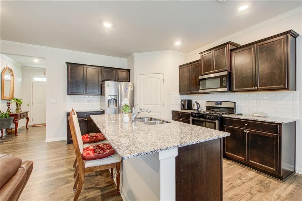 5 bedroom, 3 bathroom, 2,556 sq ft single family residence for sale at 8818 Sibella Court, Lithia Springs, GA 30122 — photo 6
