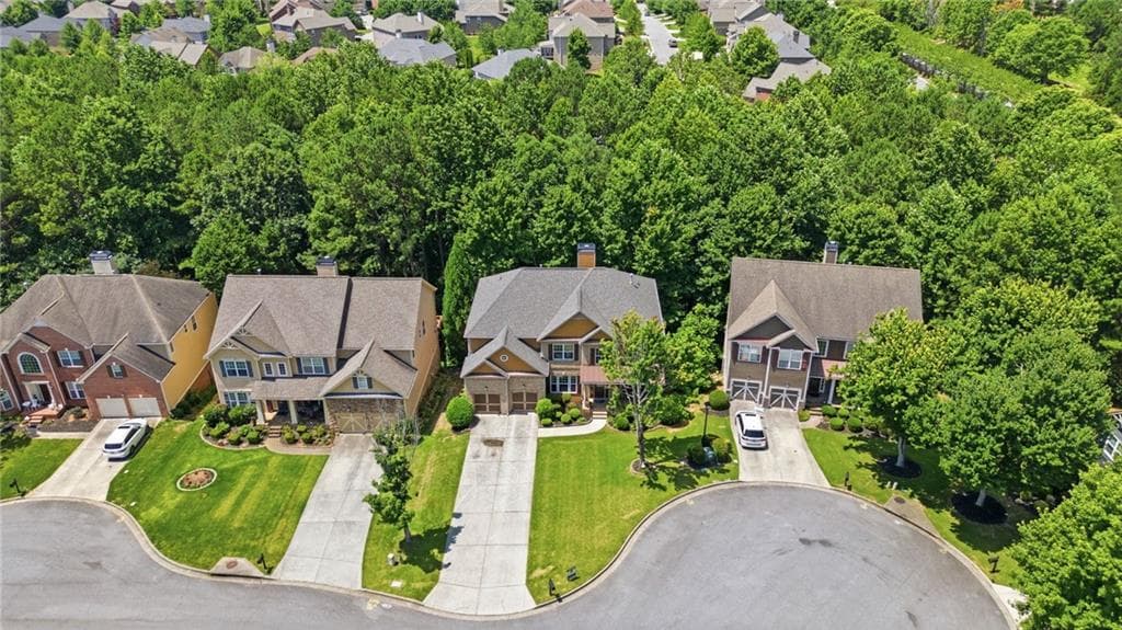 6 bedroom, 5 bathroom, 5,456 sq ft single family residence for sale at 4470 Sandalwood Way, Cumming, GA 30041 — photo 2