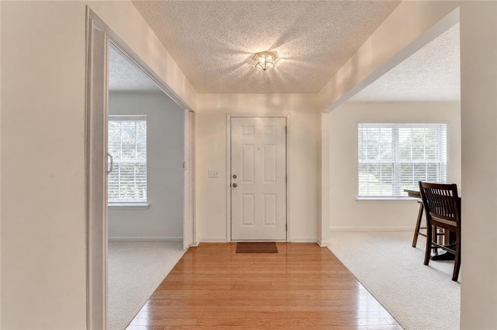 4 bedroom, 3 bathroom, 2,491 sq ft single family residence for sale at 3012 River Garden Road, Covington, GA 30016 — photo 3