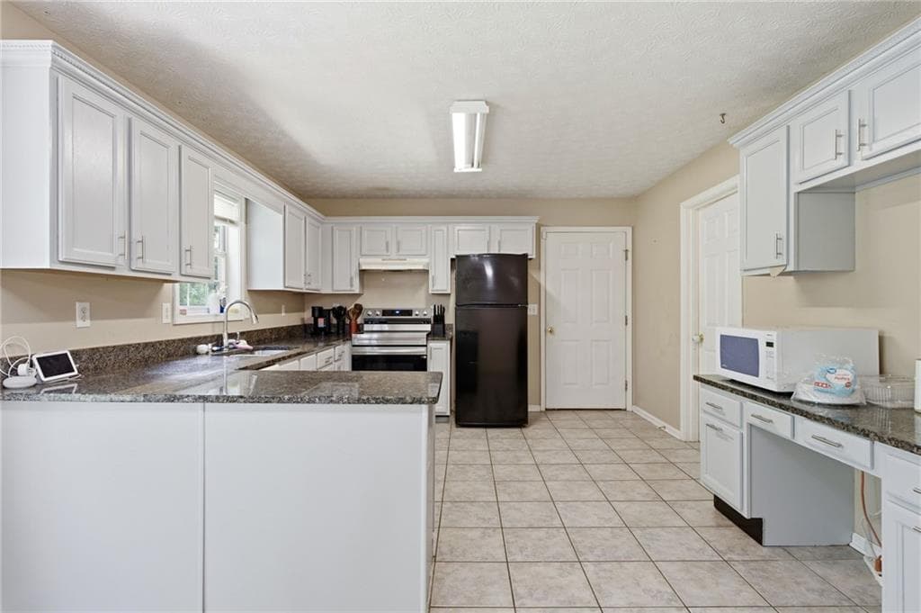 5 bedroom, 3 bathroom, 1,796 sq ft single family residence for sale at 1545 Smoke Hill Drive, Hoschton, GA 30548 — photo 10