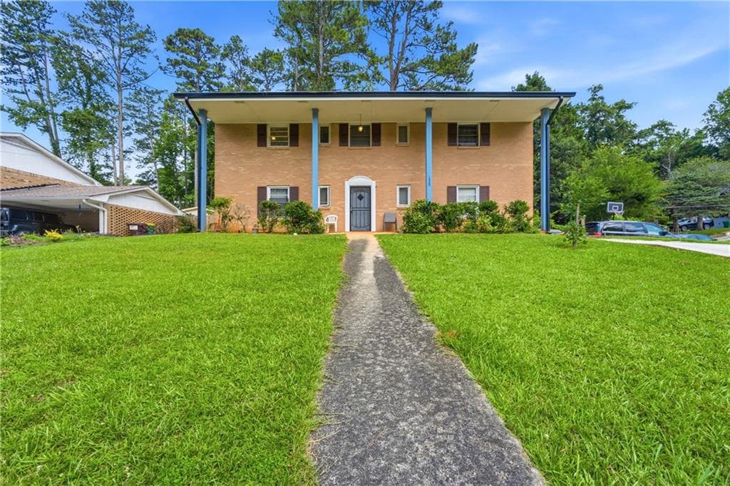 5 bedroom, 2 bathroom, 1,862 sq ft single family residence for sale at 1020 Cedar Circle, Forest Park, GA 30297 — photo 2