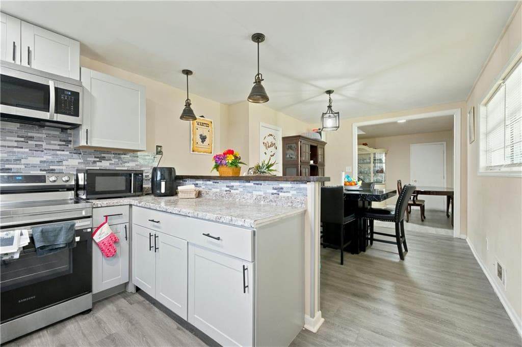 5 bedroom, 2 bathroom, 1,862 sq ft single family residence for sale at 1020 Cedar Circle, Forest Park, GA 30297 — photo 7