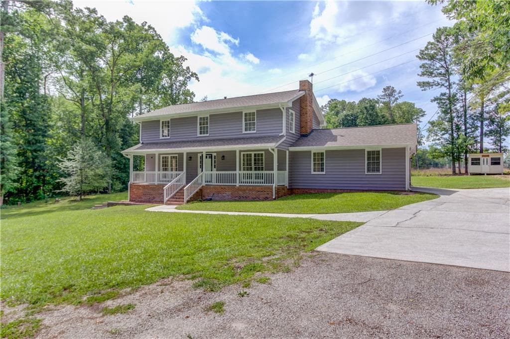 4 bedroom, 3 bathroom, 2,092 sq ft single family residence for sale at 355 Brand Road, Loganville, GA 30052 — photo 3