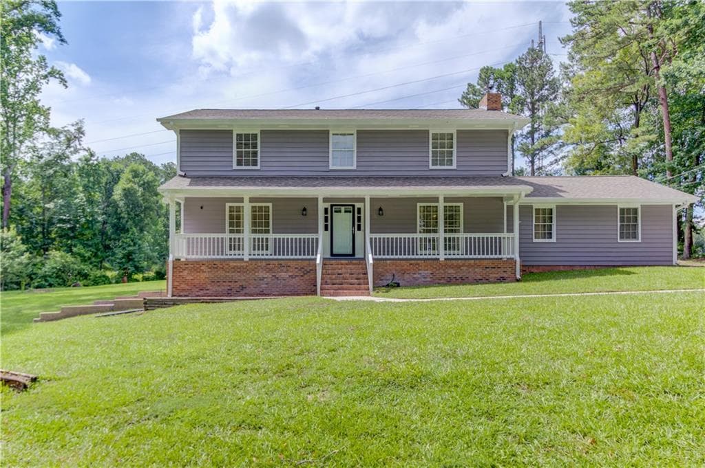 4 bedroom, 3 bathroom, 2,092 sq ft single family residence for sale at 355 Brand Road, Loganville, GA 30052 — photo 4