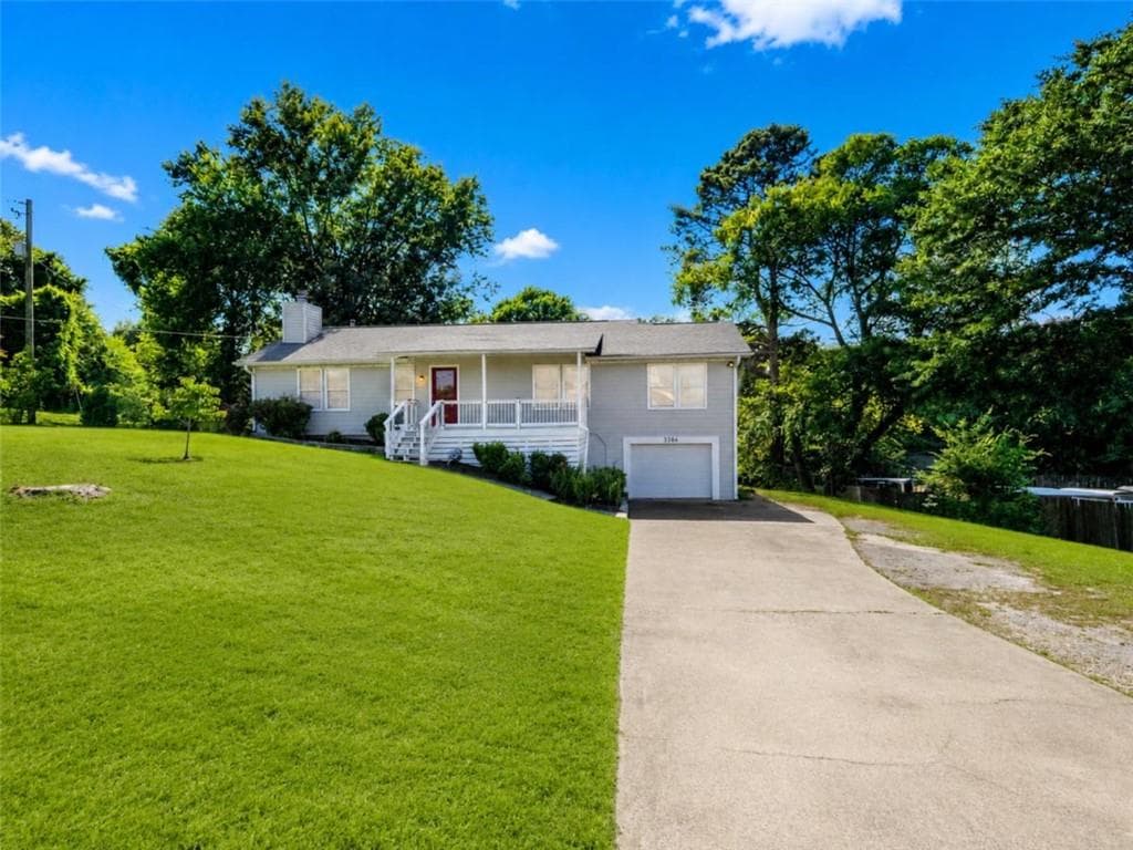 3 bedroom, 2 bathroom, 1,408 sq ft single family residence for rent at 3386 Trickum Road, Woodstock, GA 30188 for $2,300 a month — photo 1 of 18