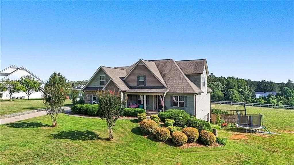 7 bedroom, 5 bathroom, 5,204 sq ft single family residence for sale at 5105 E Highway 166, Carrollton, GA 30116 — photo 2
