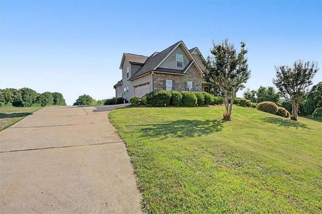 7 bedroom, 5 bathroom, 5,204 sq ft single family residence for sale at 5105 E Highway 166, Carrollton, GA 30116 — photo 4
