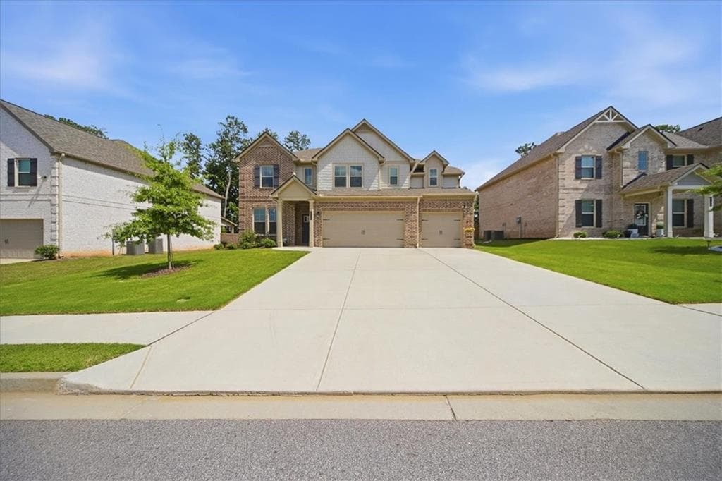 5 bedroom, 3 bathroom, 3,150 sq ft single family residence for sale at 2116 Cadenza Circle, Dacula, GA 30019 — photo 4