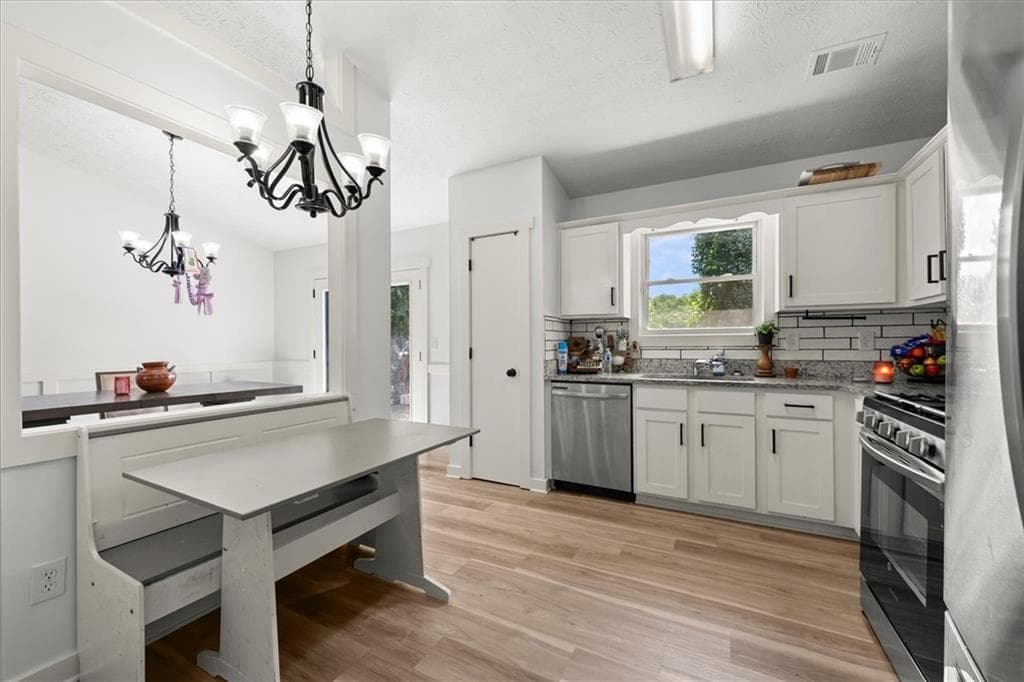 4 bedroom, 3 bathroom, 1,841 sq ft single family residence for sale at 6338 Stablewood Way, Lithonia, GA 30058 — photo 6