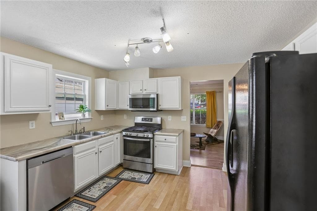 5 bedroom, 3 bathroom, 2,724 sq ft single family residence for sale at 1586 Rice Square, Lithonia, GA 30058 — photo 2