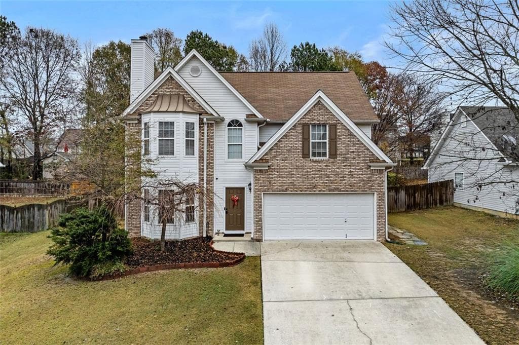 4 bedroom, 3 bathroom, 2,084 sq ft single family residence for sale at 1480 Bramlett Forest Trail, Lawrenceville, GA 30045 — photo 2