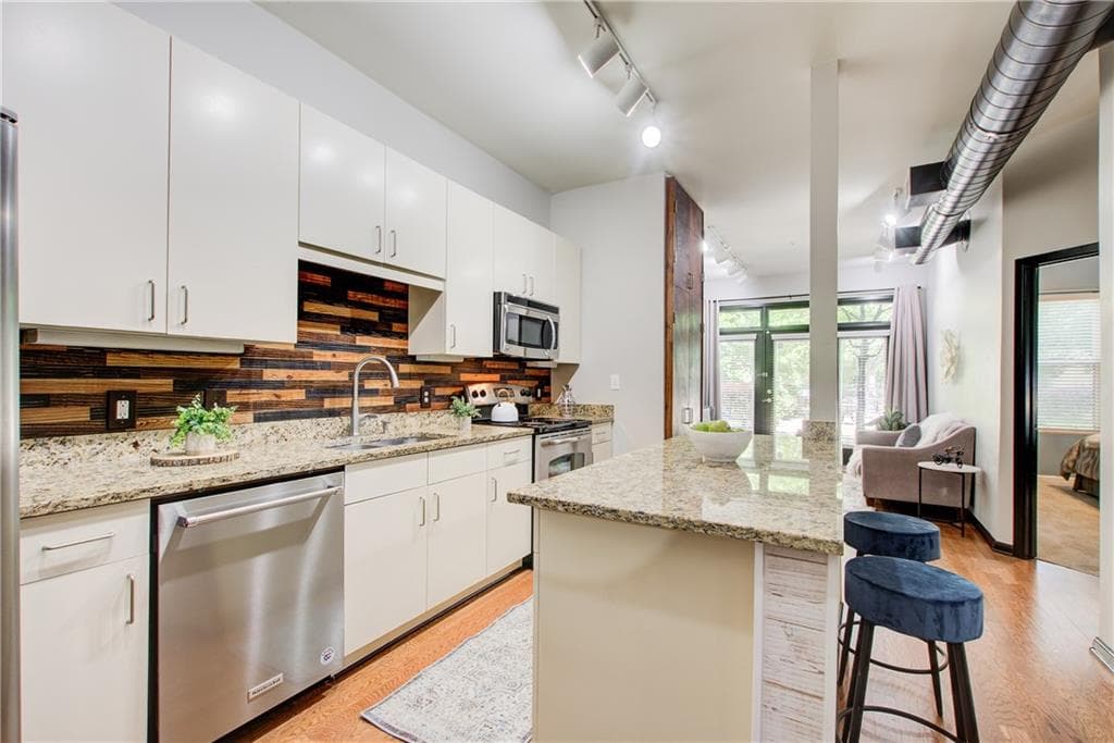 1 bedroom, 1 bathroom, 713 sq ft condominium for sale at 5300 Peachtree Road 0502, Atlanta, GA 30341 — photo 1 of 36