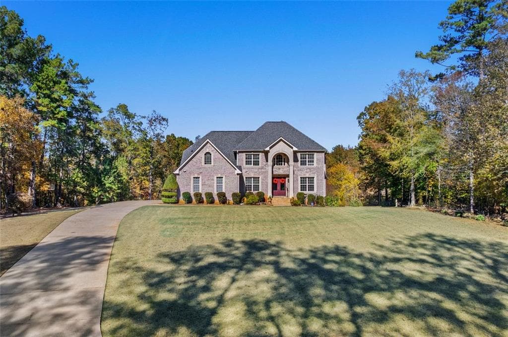 6 bedroom, 6 bathroom, 5,805 sq ft single family residence for sale at 2202 Escalade Court, Conyers, GA 30094 — photo 2