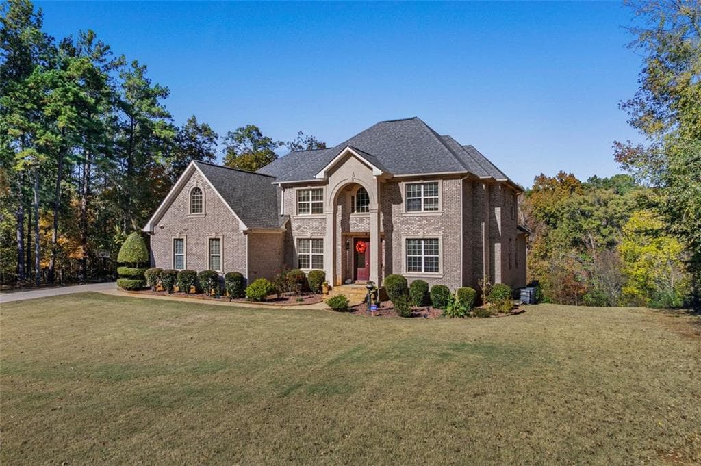 6 bedroom, 6 bathroom, 5,805 sq ft single family residence for sale at 2202 Escalade Court, Conyers, GA 30094 — photo 4
