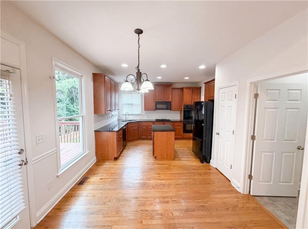 6 bedroom, 4 bathroom, 2,605 sq ft single family residence for sale at 685 Jefferson Place, Cumming, GA 30040 — photo 8