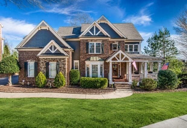 6 bedroom, 5 bathroom, 5,110 sq ft single family residence for sale at 6011 Lost Maple Lane, Sugar Hill, GA 30518 — photo 2
