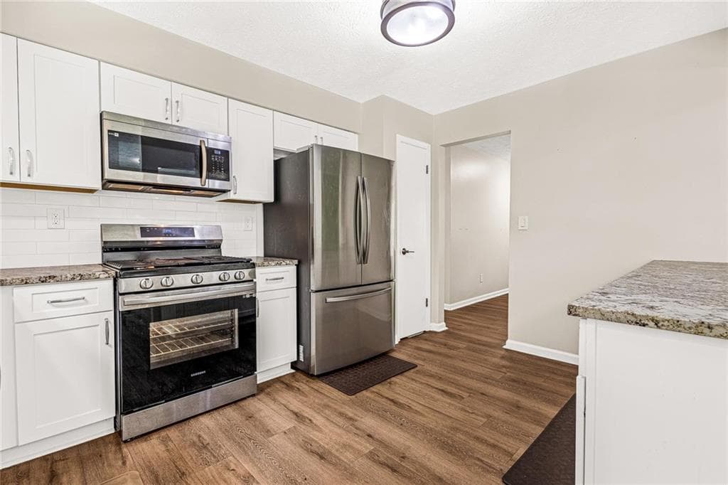 3 bedroom, 2 bathroom, 1,417 sq ft single family residence for sale at 3926 Dalhouise Lane, Decatur, GA 30034 — photo 6