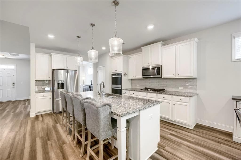 4 bedroom, 4 bathroom, 3,000 sq ft single family residence for sale at 7850 Bristol Valley Drive, Cumming, GA 30028 — photo 7