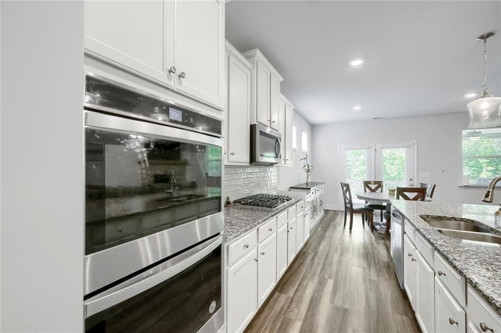 4 bedroom, 4 bathroom, 3,000 sq ft single family residence for sale at 7850 Bristol Valley Drive, Cumming, GA 30028 — photo 9