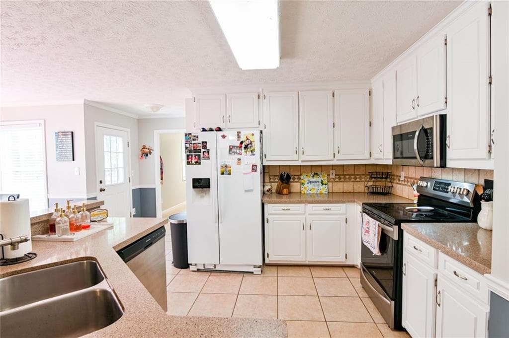 4 bedroom, 3 bathroom, 2,536 sq ft single family residence for sale at 1901 Mcconnell Road, Grayson, GA 30017 — photo 9