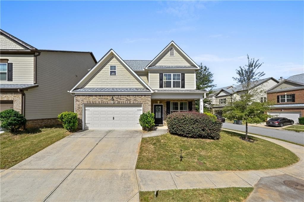 4 bedroom, 3 bathroom, 2,619 sq ft single family residence for sale at 3158 Onamia Road, Duluth, GA 30096 — photo 2