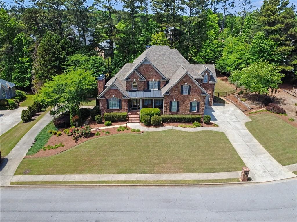 8 bedroom, 6 bathroom, 7,661 sq ft single family residence sold at 3180 Mulberry Oaks Court, Dacula, GA 30019