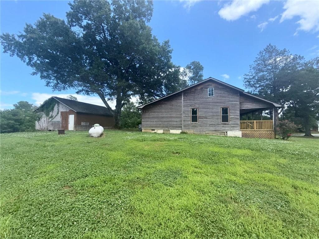 3 bedroom, 1 bathroom, 1,680 sq ft single family residence for sale at 571 Autry Road, Plainville, GA 30733 — photo 5