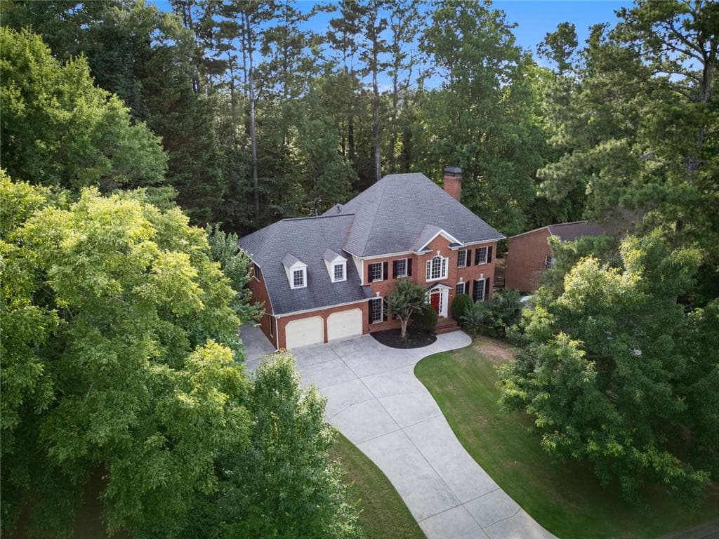 6 bedroom, 5 bathroom, 3,189 sq ft single family residence for sale at 5415 Hampstead Way, Duluth, GA 30097 — photo 2