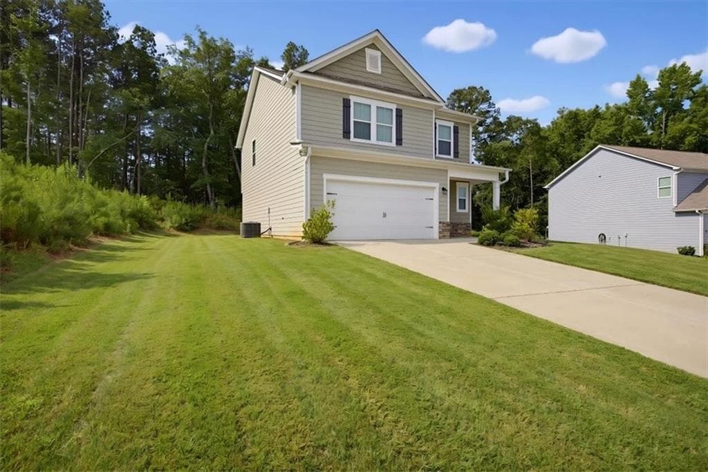 4 bedroom, 3 bathroom, 1,849 sq ft single family residence for sale at 761 Jackson Court, Social Circle, GA 30025 — photo 3