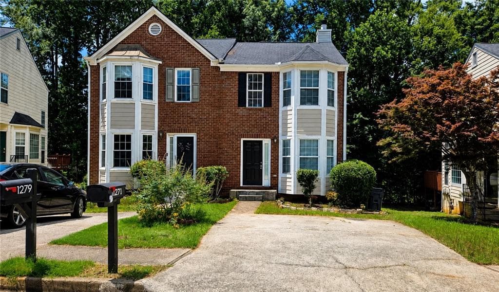 2 bedroom, 3 bathroom, 1,248 sq ft townhouse for rent at 1271 Vintage Pointe Dr, Lawrenceville, GA 30044 for $1,700 a month — photo 1 of 20