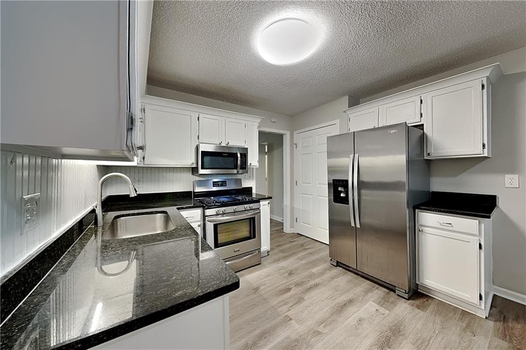 4 bedroom, 2 bathroom, 1,960 sq ft single family residence for rent at 5336 Muirwood Place, Powder Springs, GA 30127 for $2,045 a month — photo 4
