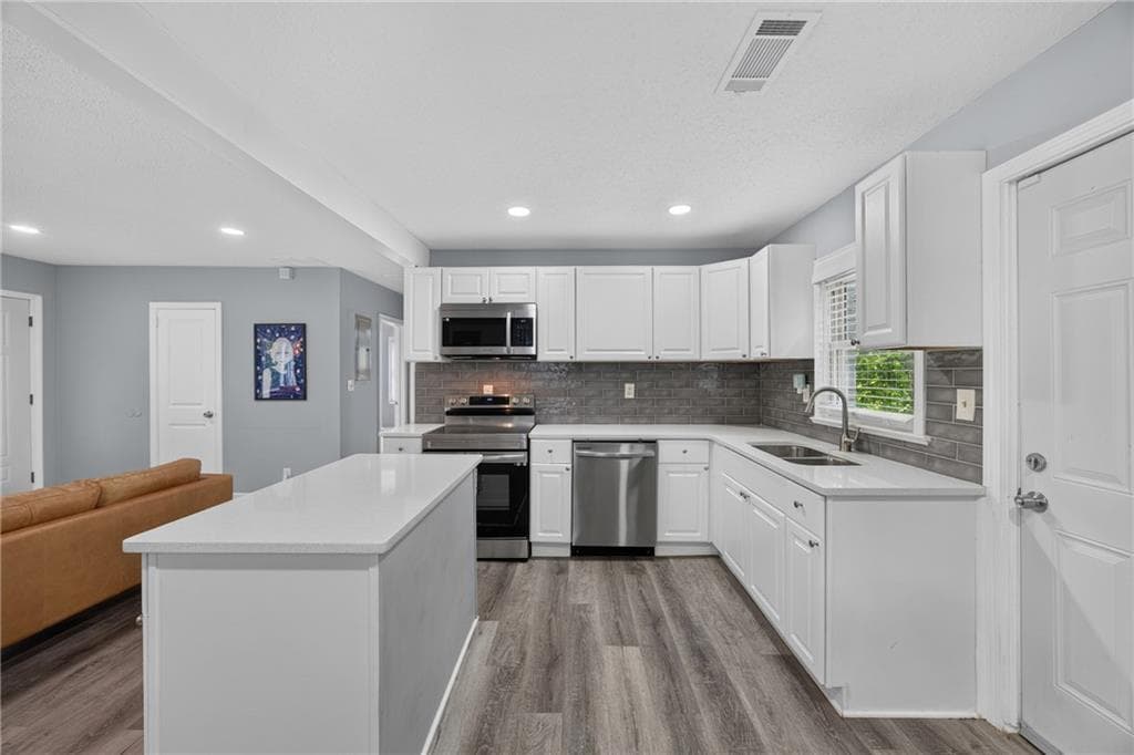 4 bedroom, 2 bathroom, 1,800 sq ft single family residence for sale at 2162 Doris Drive, Decatur, GA 30034 — photo 5