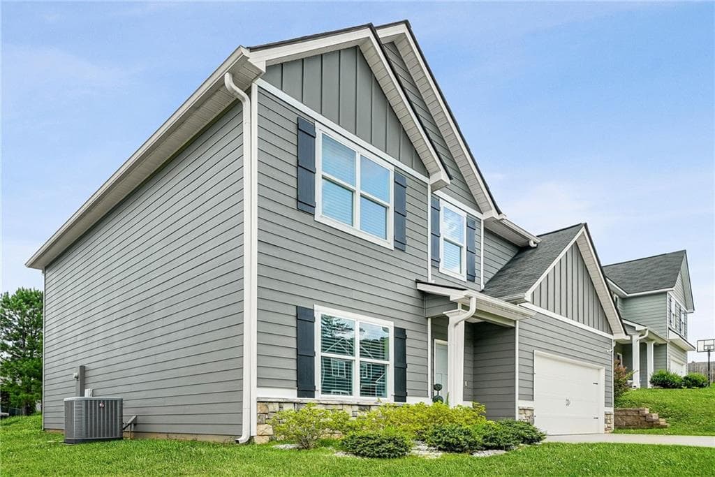 4 bedroom, 3 bathroom, 2,733 sq ft single family residence for sale at 409 Splash Pointe, Temple, GA 30179 — photo 2