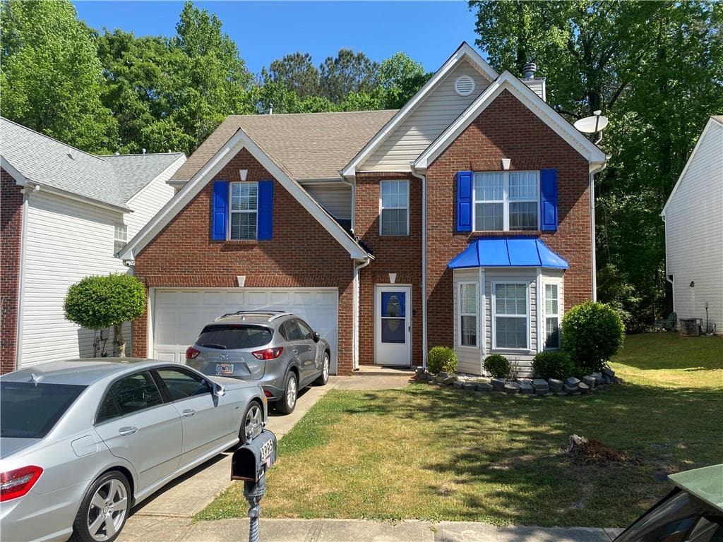 4 bedroom, 3 bathroom, 2,167 sq ft single family residence for sale at 3995 Jackson Shoals Court, Lawrenceville, GA 30044 — photo 2