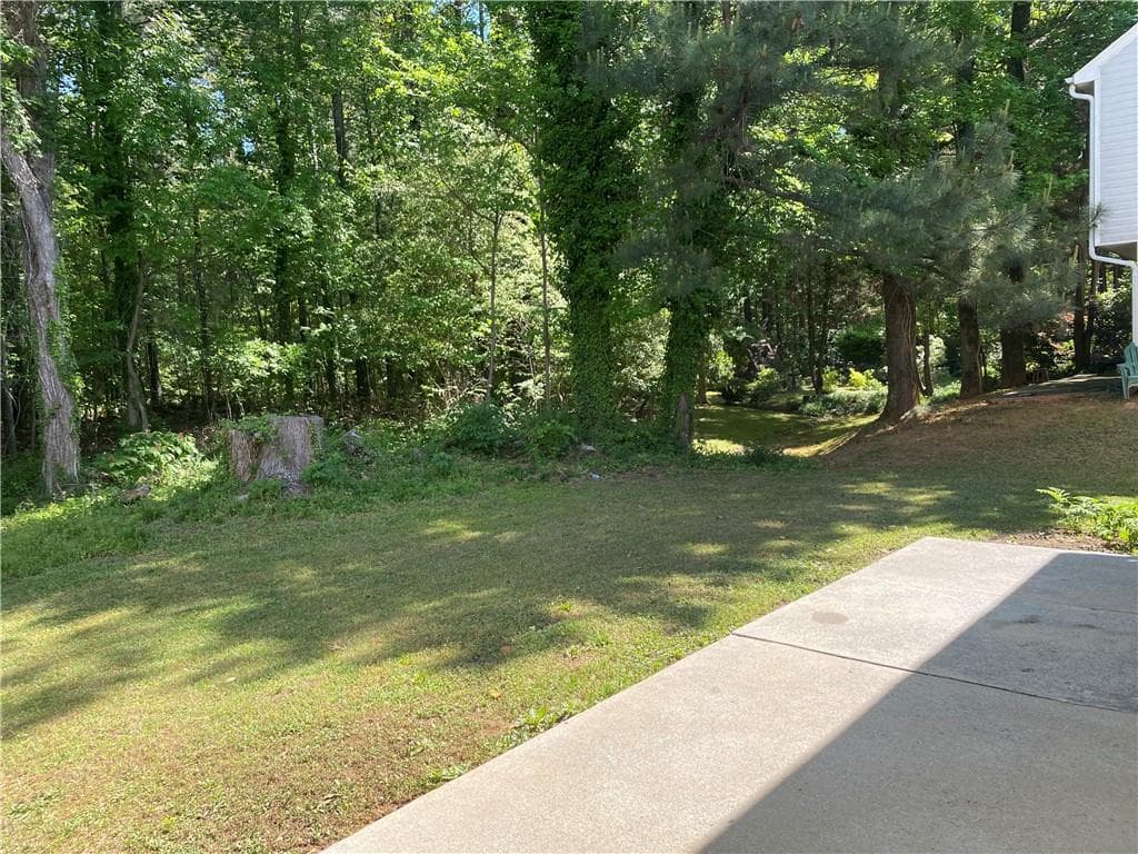 4 bedroom, 3 bathroom, 2,167 sq ft single family residence for sale at 3995 Jackson Shoals Court, Lawrenceville, GA 30044 — photo 4