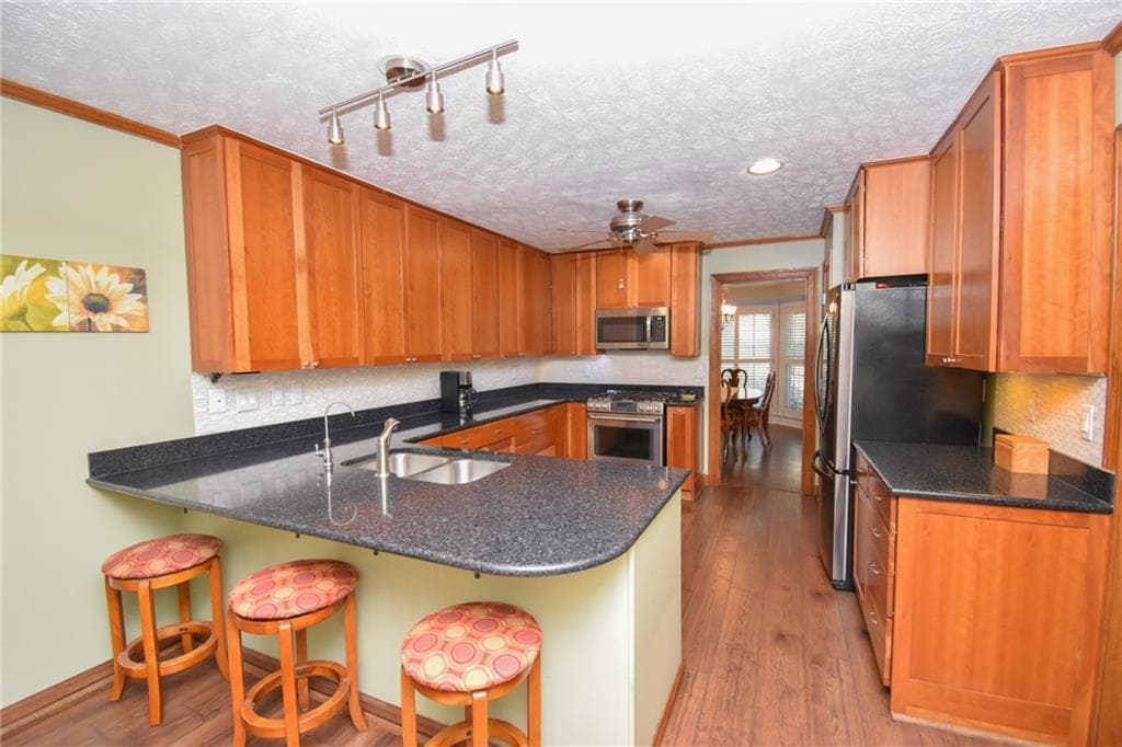 5 bedroom, 3 bathroom, 2,992 sq ft single family residence for sale at 5245 Bowers Brook Drive, Lilburn, GA 30047 — photo 7