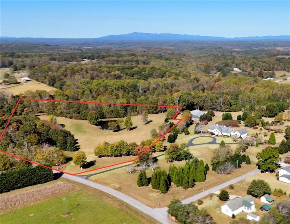 5 bedroom, 4 bathroom unimproved land for sale at 7755 Blacks Mill Road, Dawsonville, GA 30534
