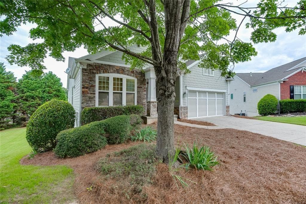 5 bedroom, 3 bathroom, 4,116 sq ft single family residence for sale at 5130 Princess Lane, Cumming, GA 30040 — photo 3