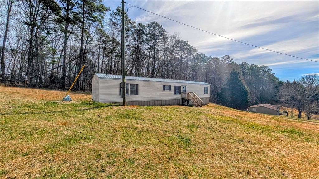 3 bedroom, 2 bathroom single family residence under contract at 1562 Grindle Bridge Road, Dahlonega, GA 30533 — photo 2