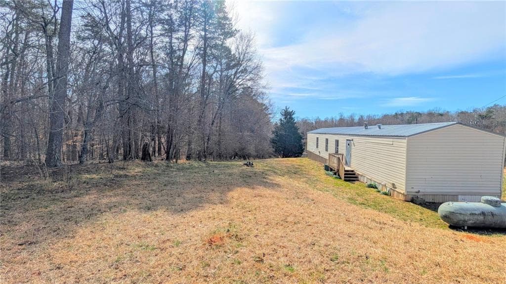 3 bedroom, 2 bathroom single family residence under contract at 1562 Grindle Bridge Road, Dahlonega, GA 30533 — photo 4