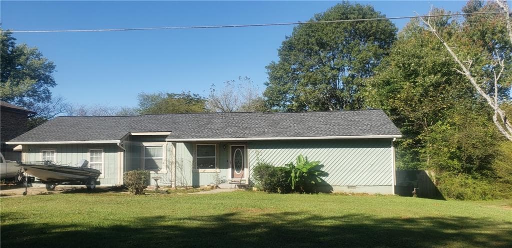 4 bedroom, 3 bathroom, 1,813 sq ft single family residence for sale at 1777 Rocky Ridge Drive, Conyers, GA 30012