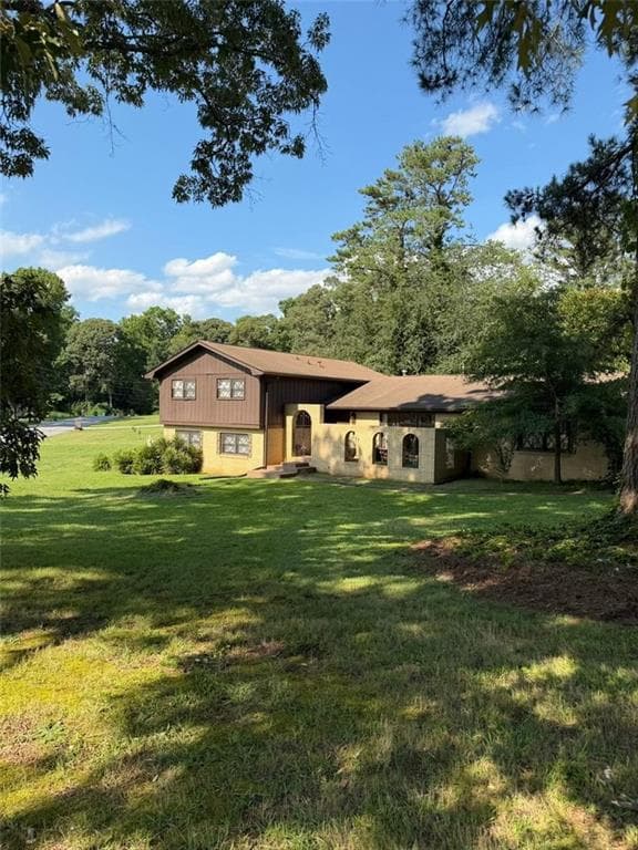 5 bedroom, 3 bathroom, 2,612 sq ft single family residence for sale at 4678 Tara Woods Drive, Ellenwood, GA 30294 — photo 2
