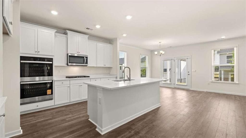 4 bedroom, 3 bathroom, 3,348 sq ft single family residence for sale at 13448 Whitman Lane, Covington, GA 30014 — photo 4